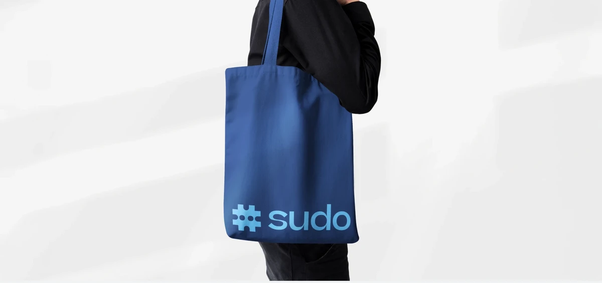 Blue Sudo tote bag mockup with the sky-blue logo